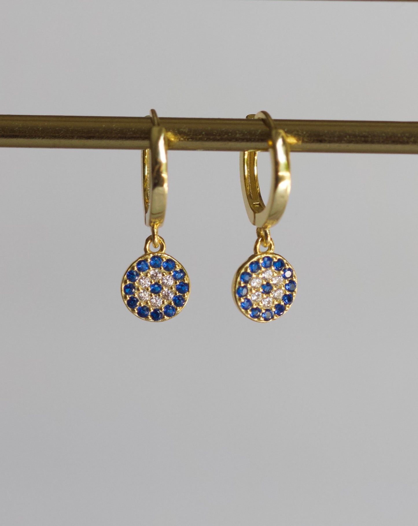 Emily sleeper with round evil eye charm