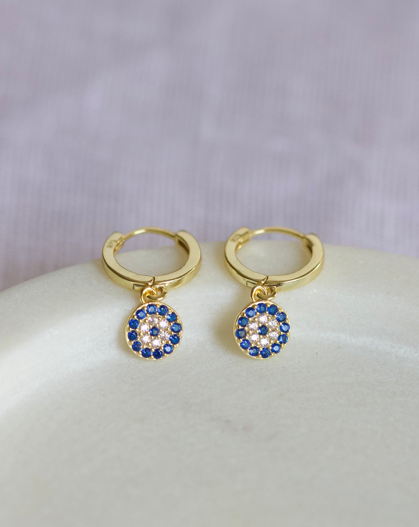 Emily sleeper with round evil eye charm