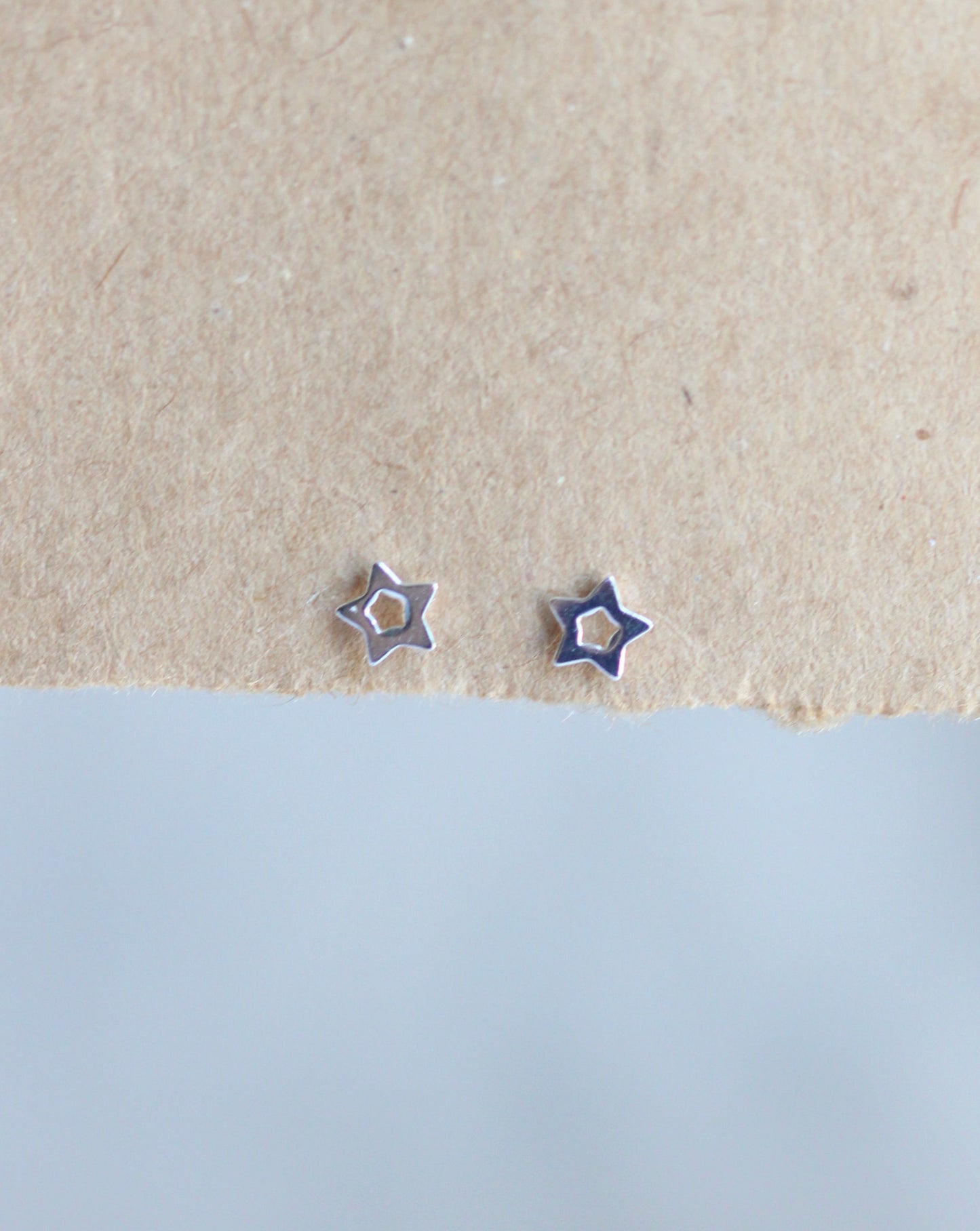 Open star stud sterling silver earrings