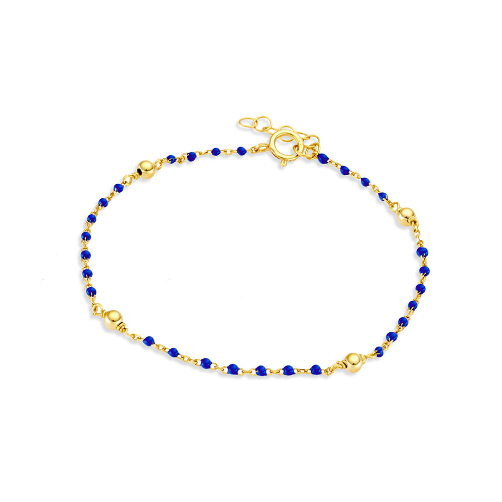 Gold plated beaded bracelet with dark blue details