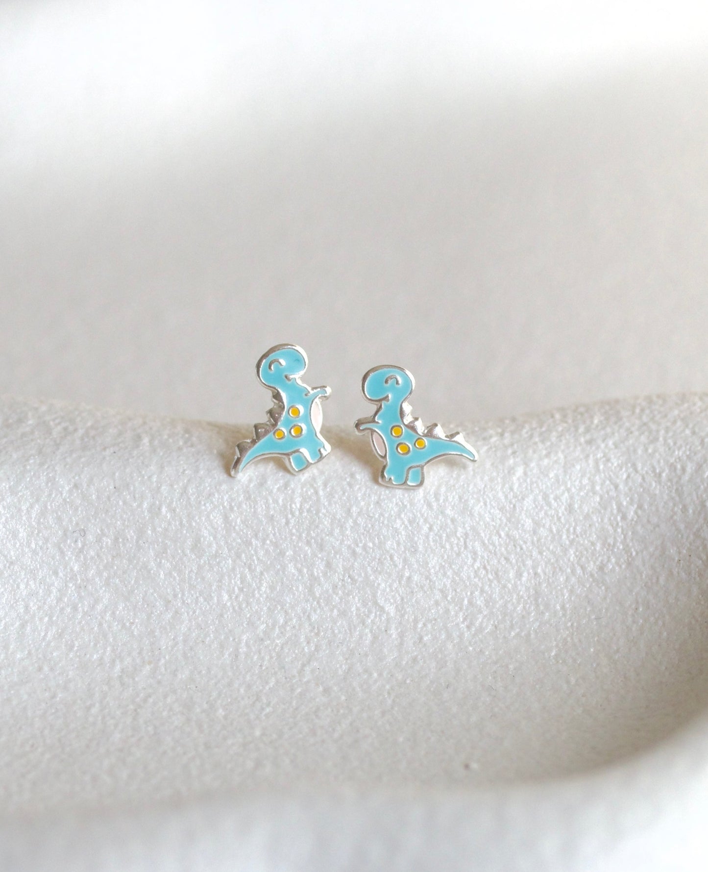 Dinosaur studs