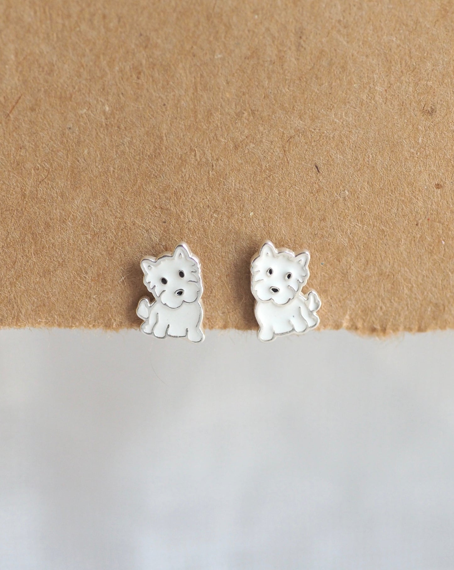 White enamel dog studs