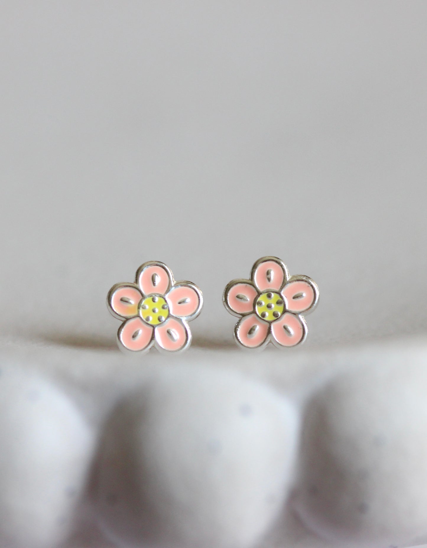 Pink and yellow enamel flower studs